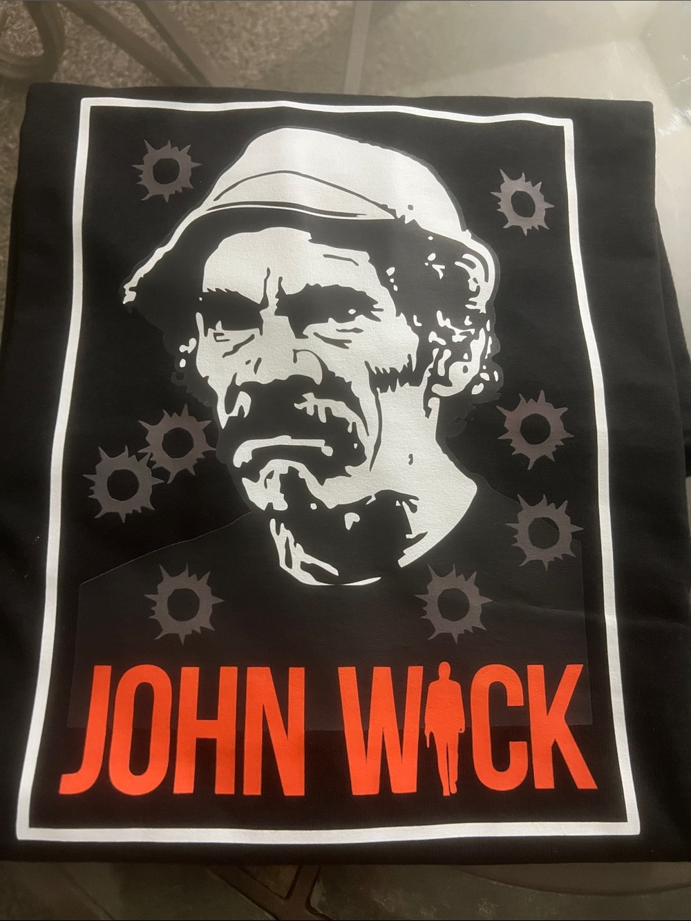 Urban Outfitters Black Graphic John Wick Tee with White and Orange Print